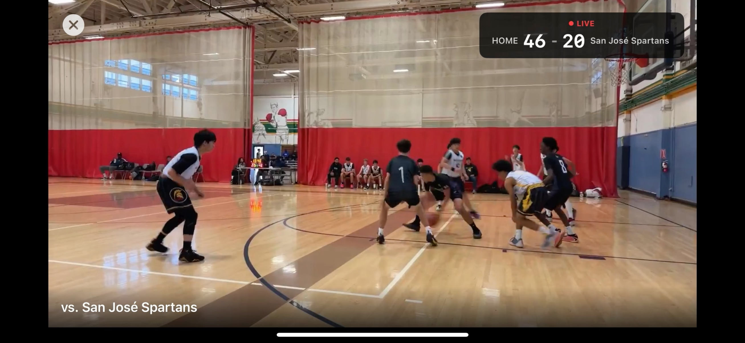 A live game in the club's app with the real-time score overlay, auto-saved as film
