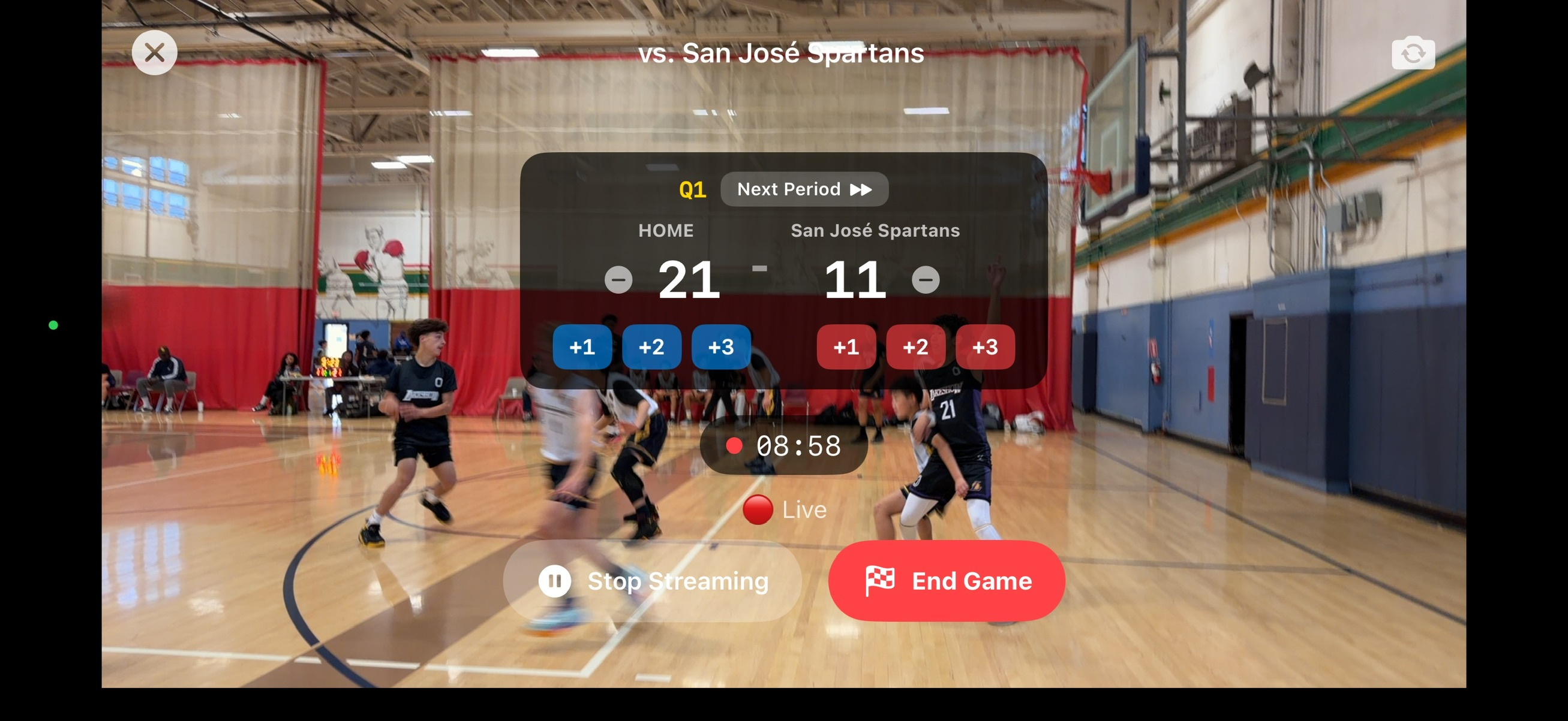 Coach streaming the game live from courtside